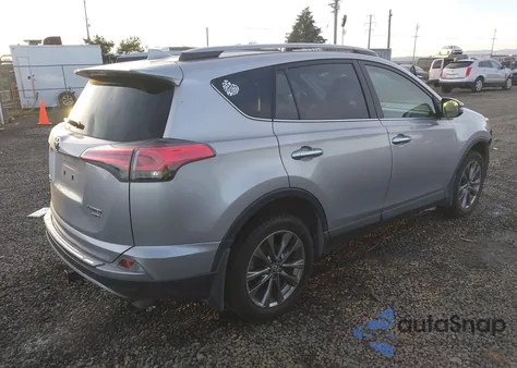 2018 Toyota Rav4 Limited z USA, uszkodzony, nr VIN JTMDFREV6JJ211708